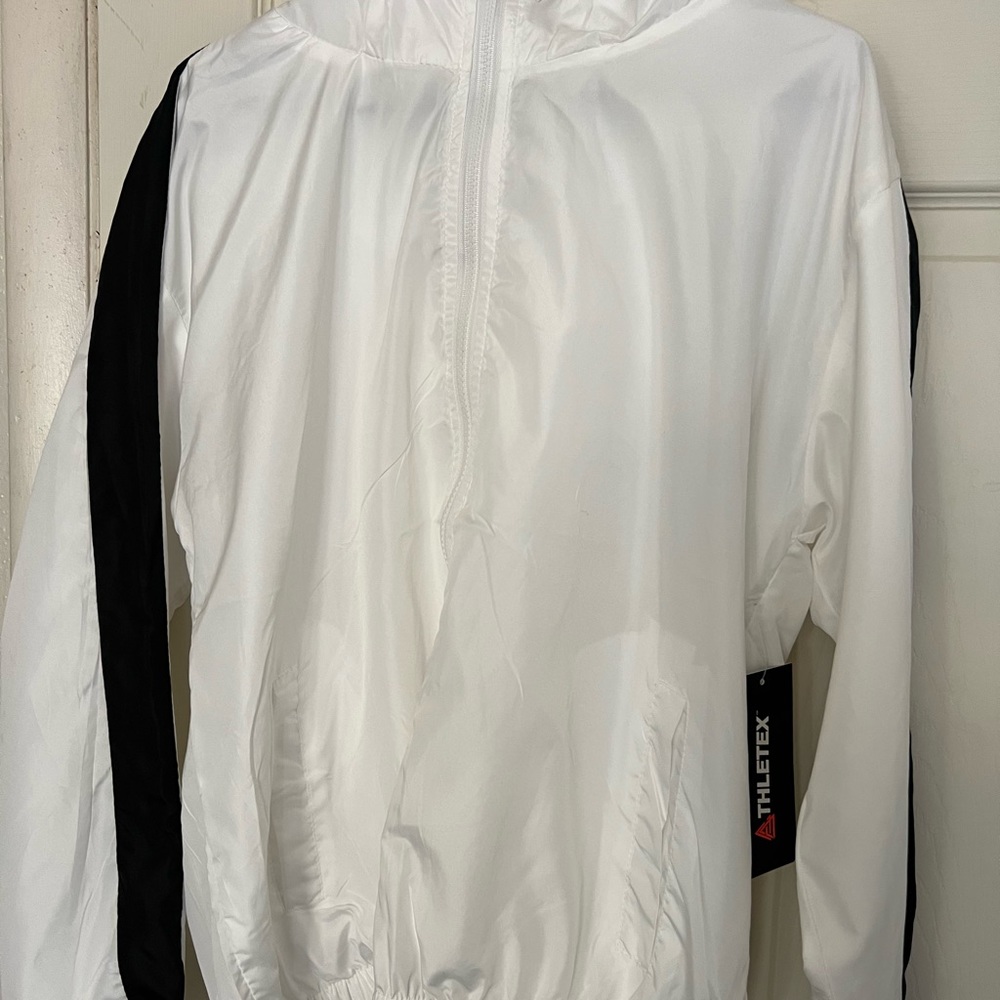 White windbreaker with black stripe on sides